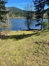 Beautiful Lake Tahuya! East facing no bank waterfront lot at the quiet end of the lake - dead end road with little traffic. Approved 3 bedroom septic design good until Oct '25, community water. In the distance, you can see the towers on Green Mountain.