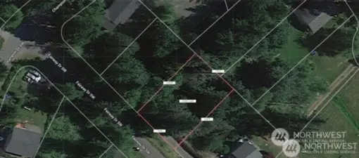 Aerial view of the property and adjacent lots and other properties
