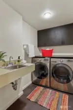 Laundry room with laundry sink.