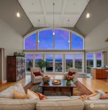 Magnificent floor to ceiling windows capture the incredible views.