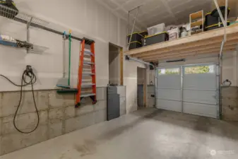 Attached Garage with EV Charging and Ample Storage!
