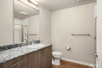 Lots of counter space and storage in bathroom