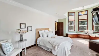 Elegant owner's suite is oversized and has a private retreat space.