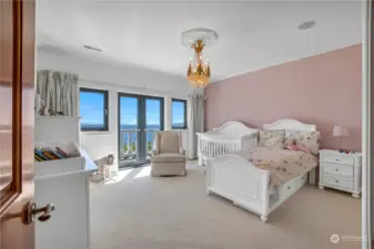 Children's Bedroom with French Doors leading out to a private balcony to take in the waterscape views. (Special childproof locks). Notice the special chandelier. Bedroom also has spacious walk in closet.