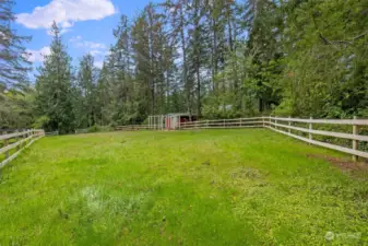 Small barn for sheltering your farm animals, opens to this fenced in pasture area!