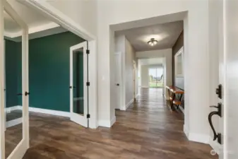 Engineered Hardwood Floors throughout with vaulted entry greets you!