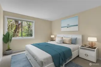 The second bedroom on the south end faces the greenbelt and the 'magical' tree. You'll have to see it! You can also see and hear the creek! Very serene!