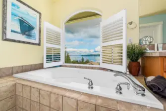Imagine this view from the primary bathroom's soaking tub!