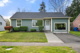 Charming bungalow in Central Tacoma. Easy access to businesses and freeway both, but peaceful. New roof   March 2024.