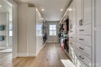 No need for bedroom furniture with these built ins located in the primary closet.