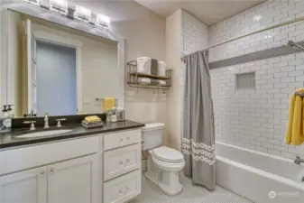 this hall bath is across the hall from the office, and serves the second bedroom on this floor.