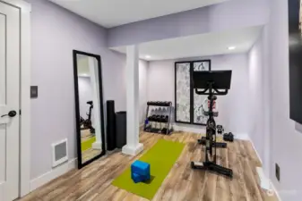 This room is ready for you to workout - or use as storage or office.