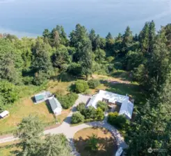 A birds eye view of property gently surrounded by wildlife (bald eagles, peregrine falcons, osprey, red hawks, barn owls and great horned owls.  A mecca of private wildlife viewing