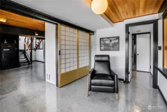 Downstairs exudes the same level of sophistication, blending sleek design with functional ease for effortless living.
