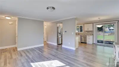 Exceptional flow and updated flooring run throughout the home.