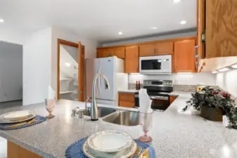 kitchen with all appliances and walk in pantry