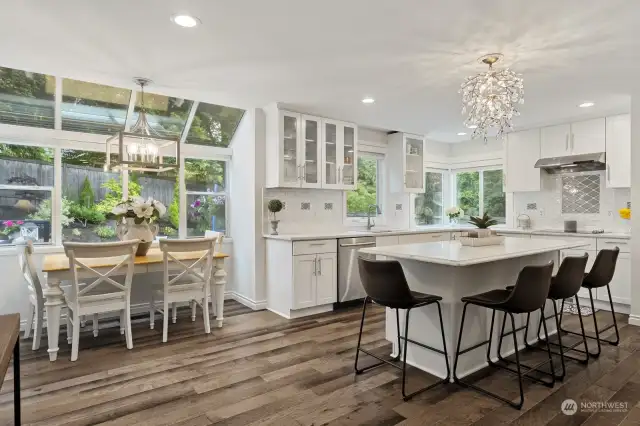 remodeled kitchen with added window for more natural light. Large bay window and luxury oversized island. Amber Ridge Bothell. Kat Hartnell Engel and Voelkers Seattle Eastside.