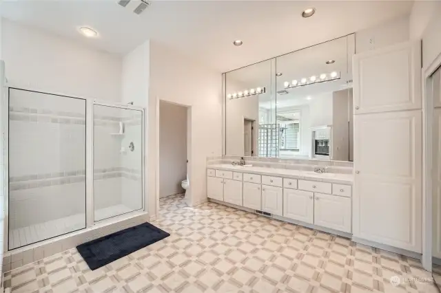 Oversized primary bath with large walk-in shower and dual sinks