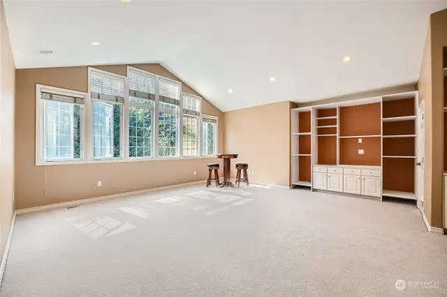 Large loft area with built-in shelving