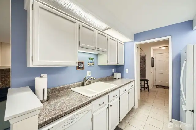 Spacious kitchen with lots of counterspace and storage.