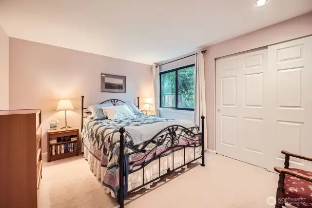 Spacious bedroom with large closets.