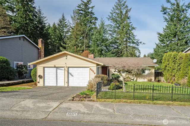 Beautiful rambler in the desirable Woodbridge community, backing directly to Olympic View Park and its trail system.
