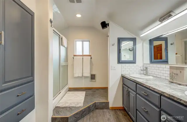 Primary suite bathroom and walk in closet