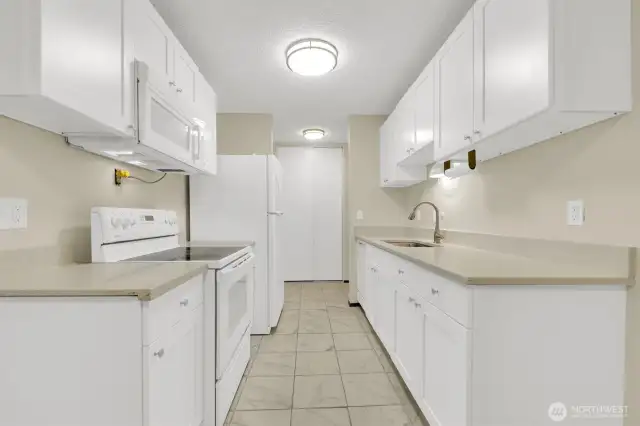 New white cabinets and quartz countertops