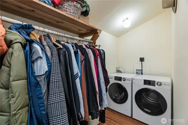 Closet off bedroom with laundry
