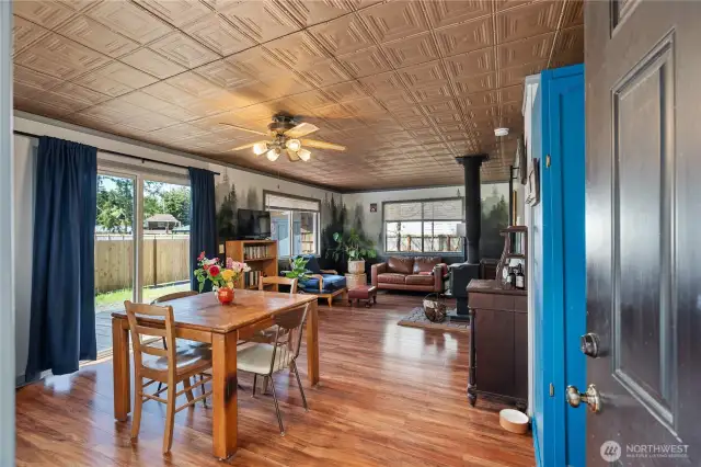 Open floor plan living area with slider to deck