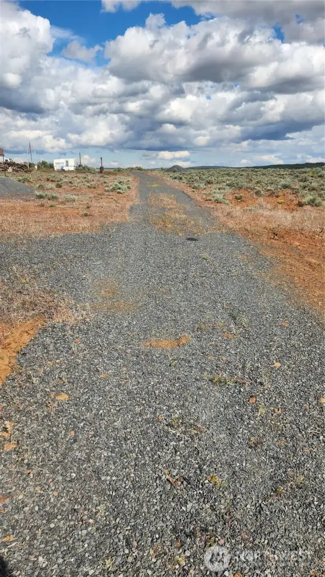 Full driveway is graveled through both lots from Coyote Trail to Trinity.