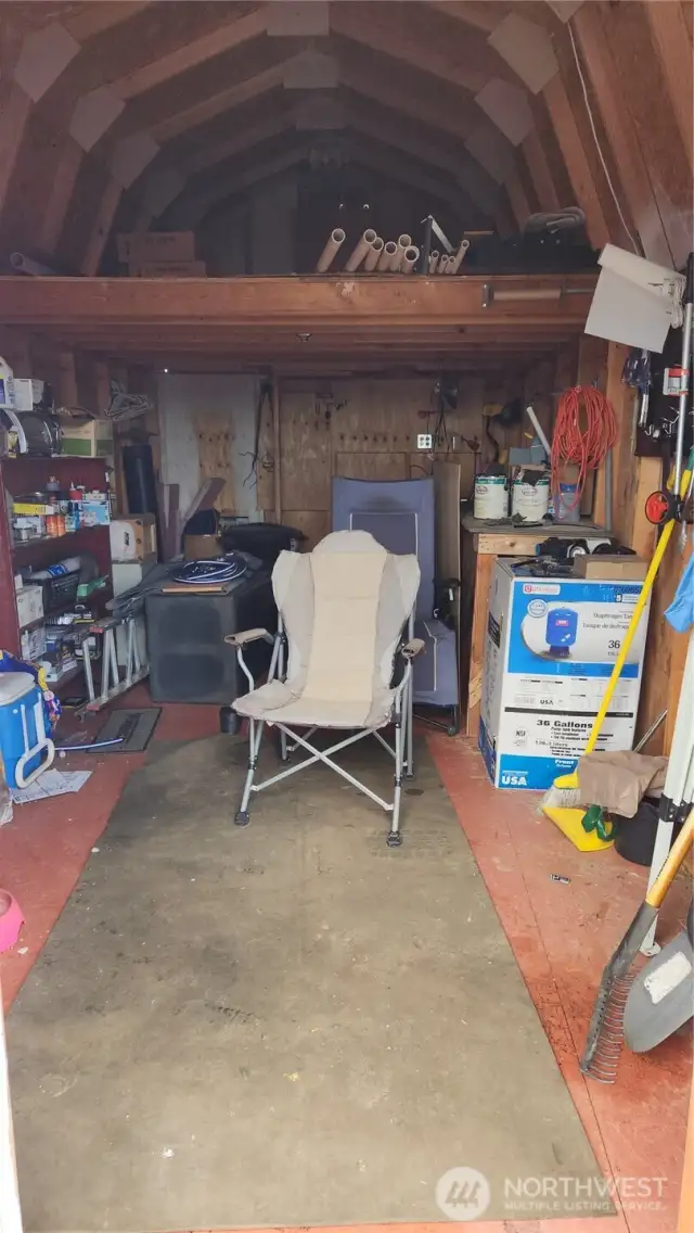 Shed interior with BBQ, Batteries, Generator, other misc tools