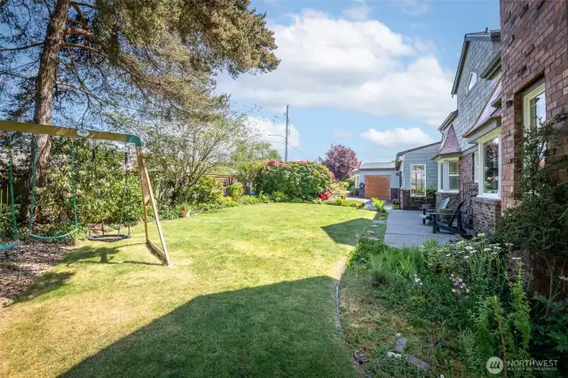 Someone in your life may love the swing set and play house just out of view...