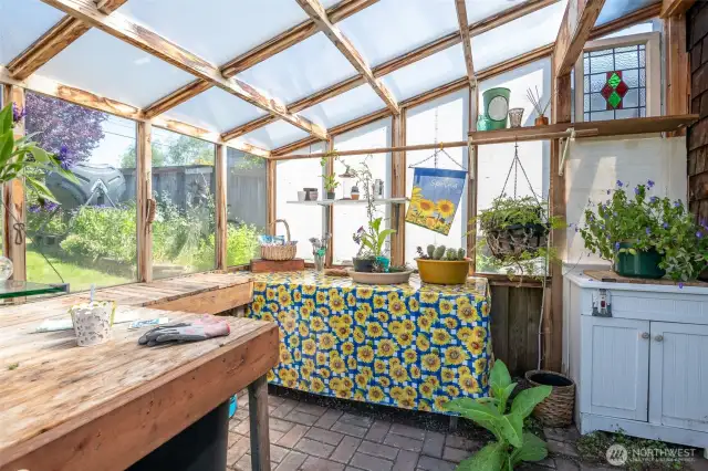 This greenhouse will make anyone feel like they want to be a gardener!