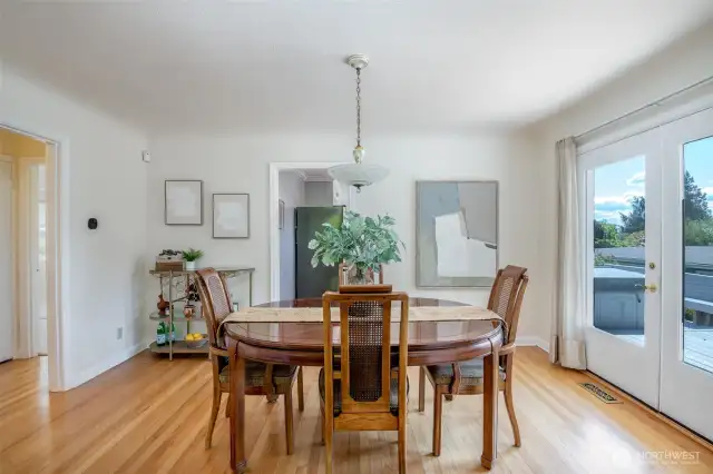 The dining room leads out to the deck - perfect for indoor/outdoor entertaining!