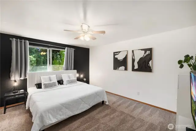 Spacious Primary Master Suite comfortably fits a king-size bed and entertainment system.