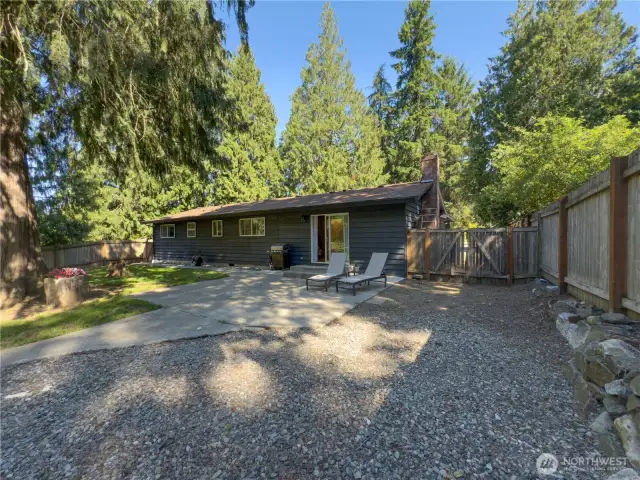Huge, fully fenced backyard with patio & fire pit area. Double gates for easy access in & out.