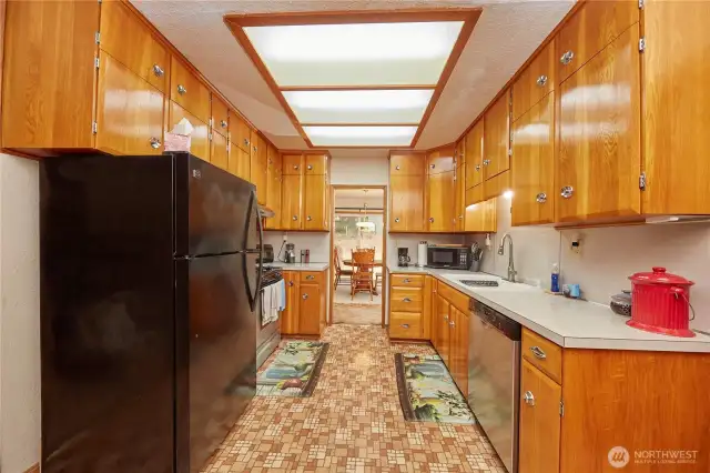 Enjoy plenty of kitchen storage paired with an open, welcoming space perfect for cooking and gathering. Easy access to both dining areas.
