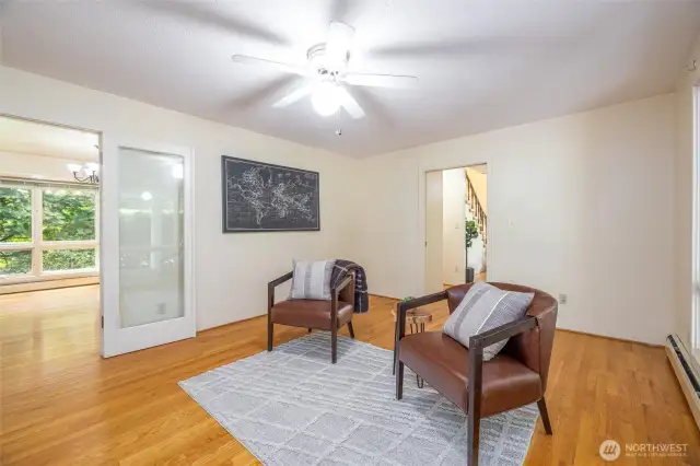 Adjacent to the kitchen is another living area, also accessible from the front foyer.