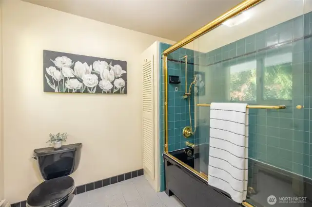 A separate shower and toilet room for the primary bathroom.