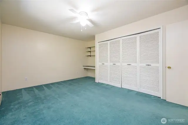 Another view of the bedroom which is very large with good storage.
