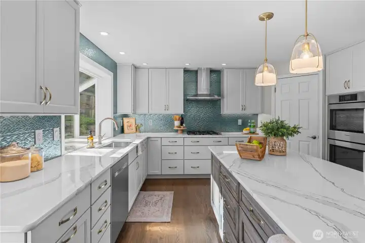 Look at all the counter space and a corner walk in pantry