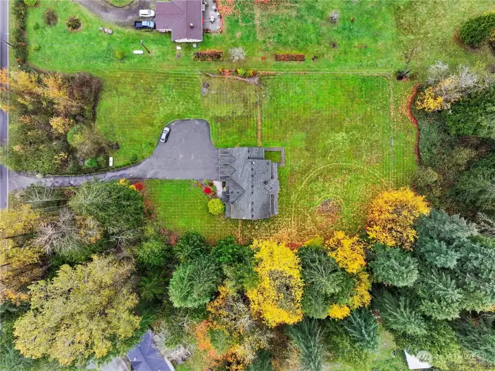 This over 2.8 acre space has lots of 'field space' as well as woods to explore