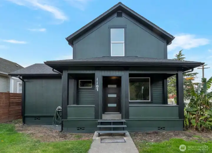 Majestic entry and front of home on quiet corner lot