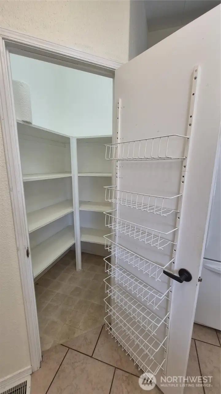 Kitchen walk-in pantry.
