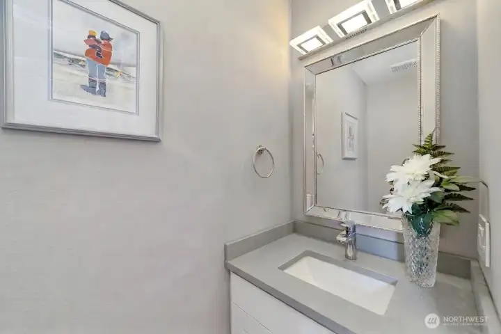 Clean and modern main floor powder bathroom.