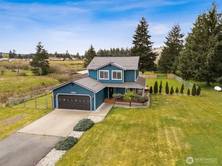 Huge front yard with long driveway