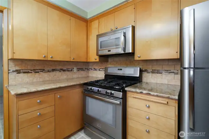View of the Frigidaire stove, microwave and refrigerator