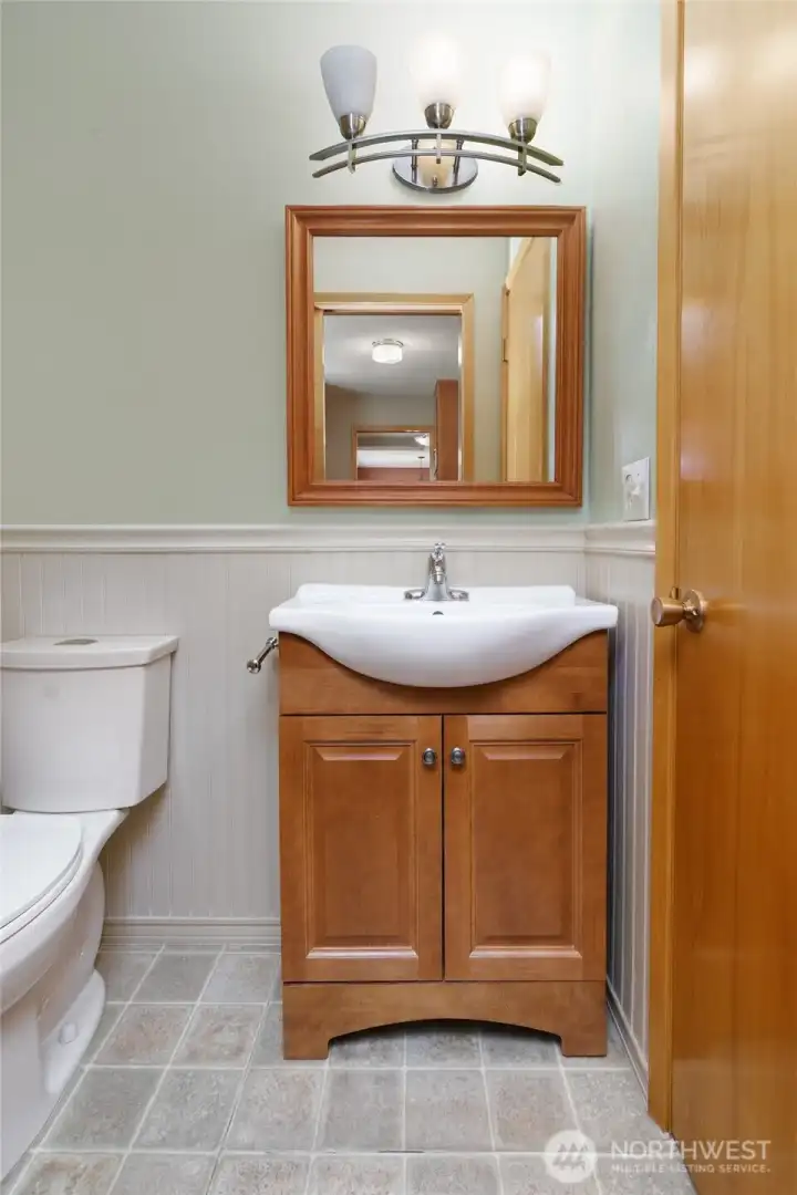 Half bath off Laundry room with potential for expansion into "Costco" room off the garage. Half bath backs up to the room in garage. Buyer to verify to their own satisfaction.