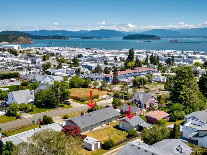 Overhead view of the property with home and shop.